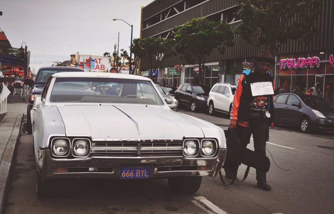 Old Car. Old Man. Young cat