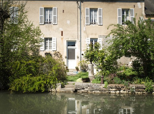 Maison les pieds dans l'eau